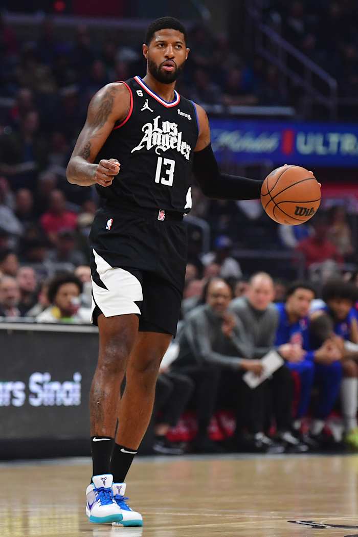 Clippers guard Paul George dribbles the ball.